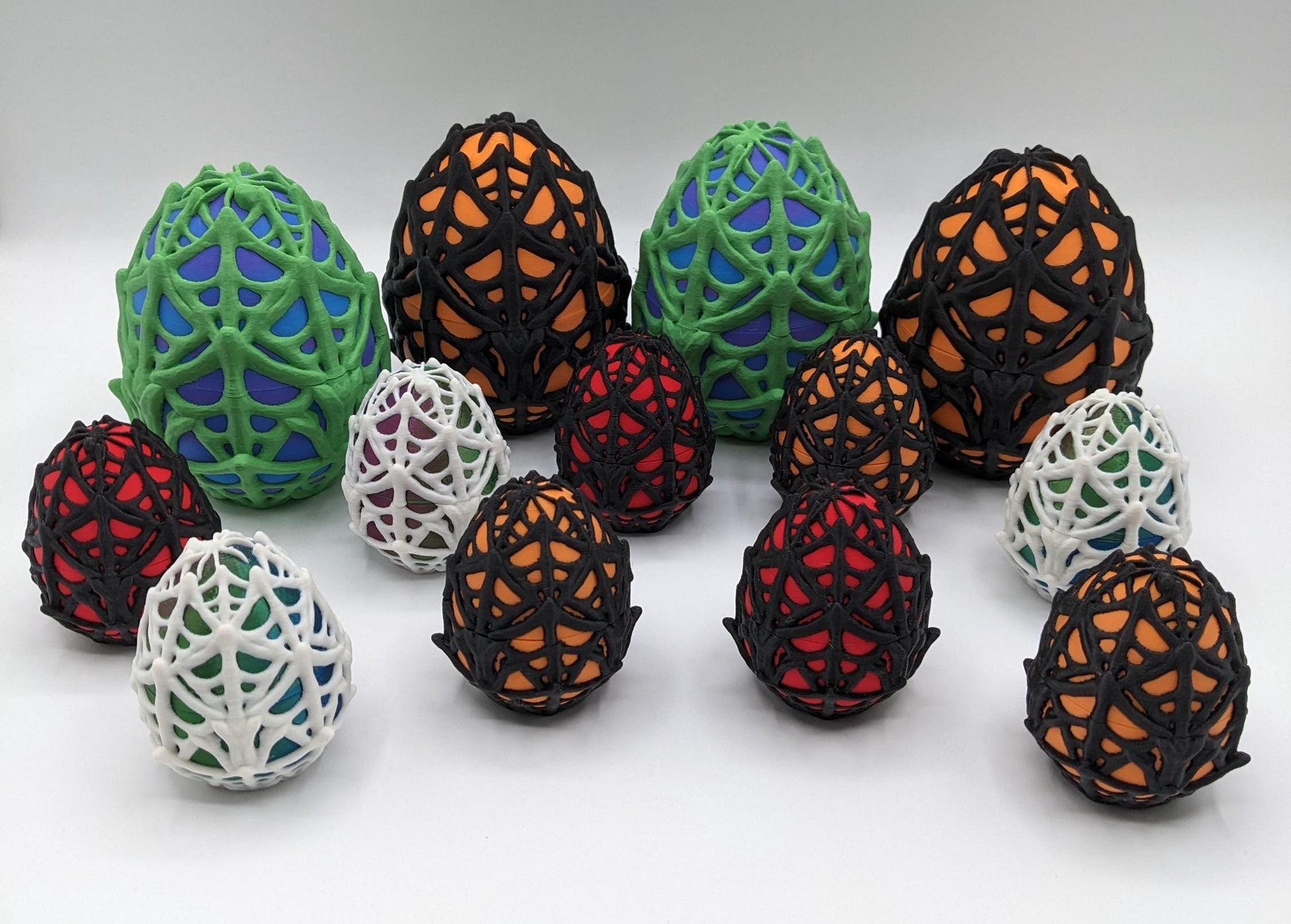 Our Spiderweb Egg with choice of spider captures the spooky fun of the season, a must-have for your festive collection. Perfect for adding a touch of mystery & fun to any room, this spiderweb egg combines intricate design with playful charm.