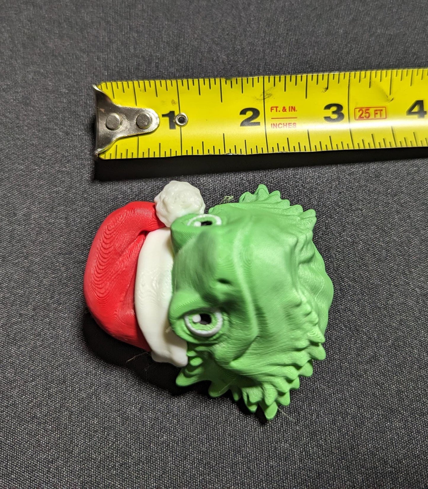 This charming ornament brings a touch of reptilian charm to your Christmas tree, making it a delightful and unique way to celebrate the season.