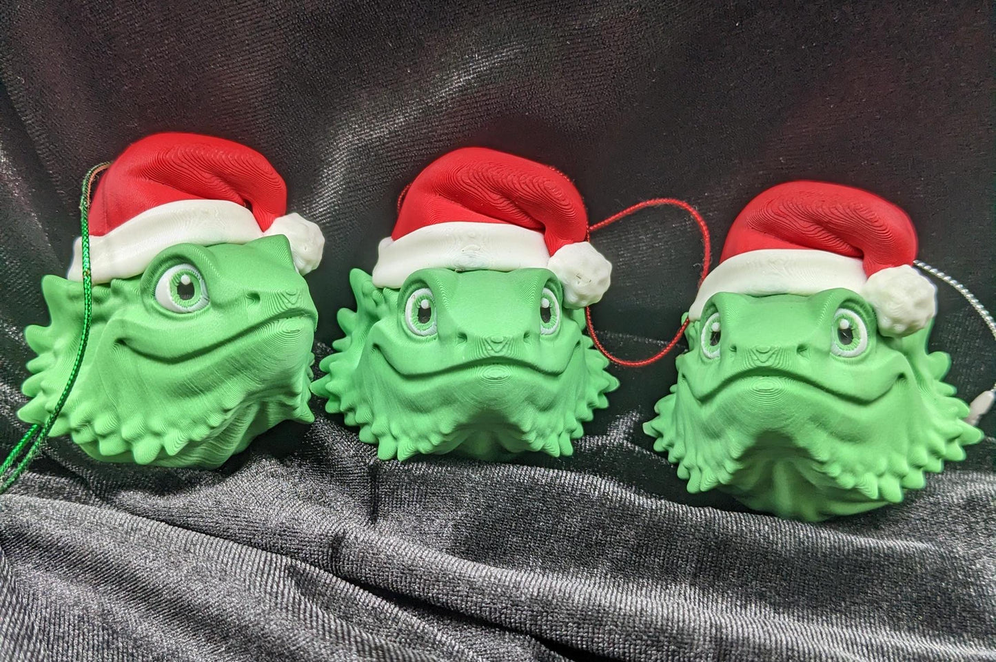 This charming ornament brings a touch of reptilian charm to your Christmas tree, making it a delightful and unique way to celebrate the season.