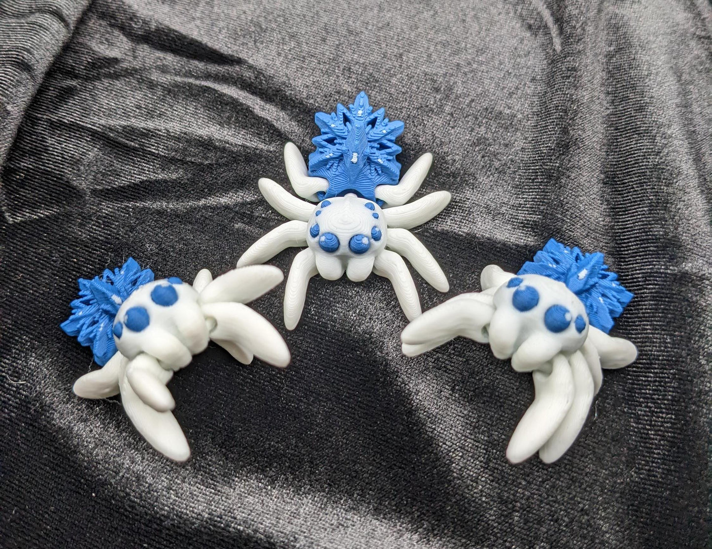 Capture the beauty of winter with our Articulated Snowflake Spider Fidget Toy! This one-of-a-kind spider features intricate snowflake design on its body adding a festive and elegant touch to its playful functionality.