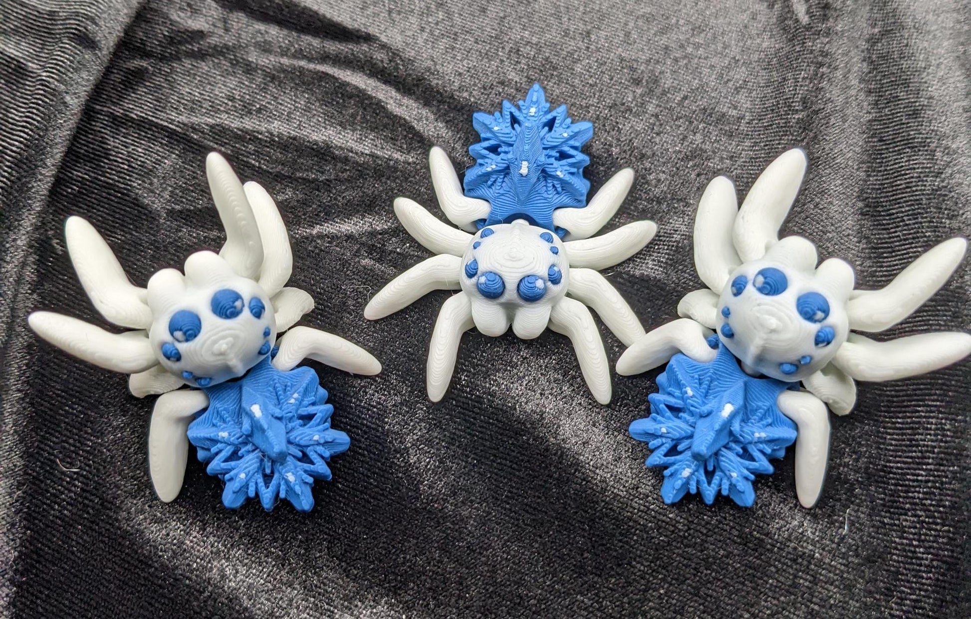 Capture the beauty of winter with our Articulated Snowflake Spider Fidget Toy! This one-of-a-kind spider features intricate snowflake design on its body adding a festive and elegant touch to its playful functionality.