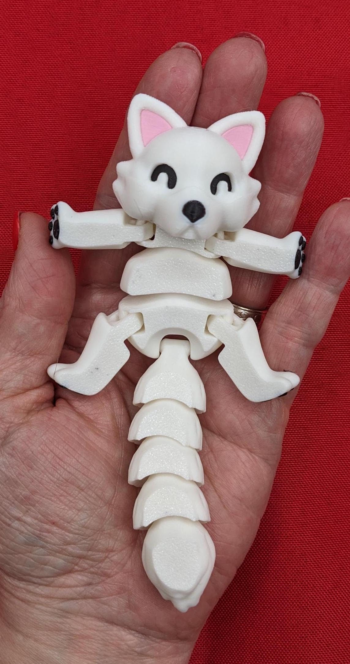 Bring the beauty of the Arctic into your hands with our Articulated Arctic Fox Fidget Toy with movable joints, allowing you to pose & play with it in countless ways. Ideal for fidgeting, stress relief, & imaginative play.