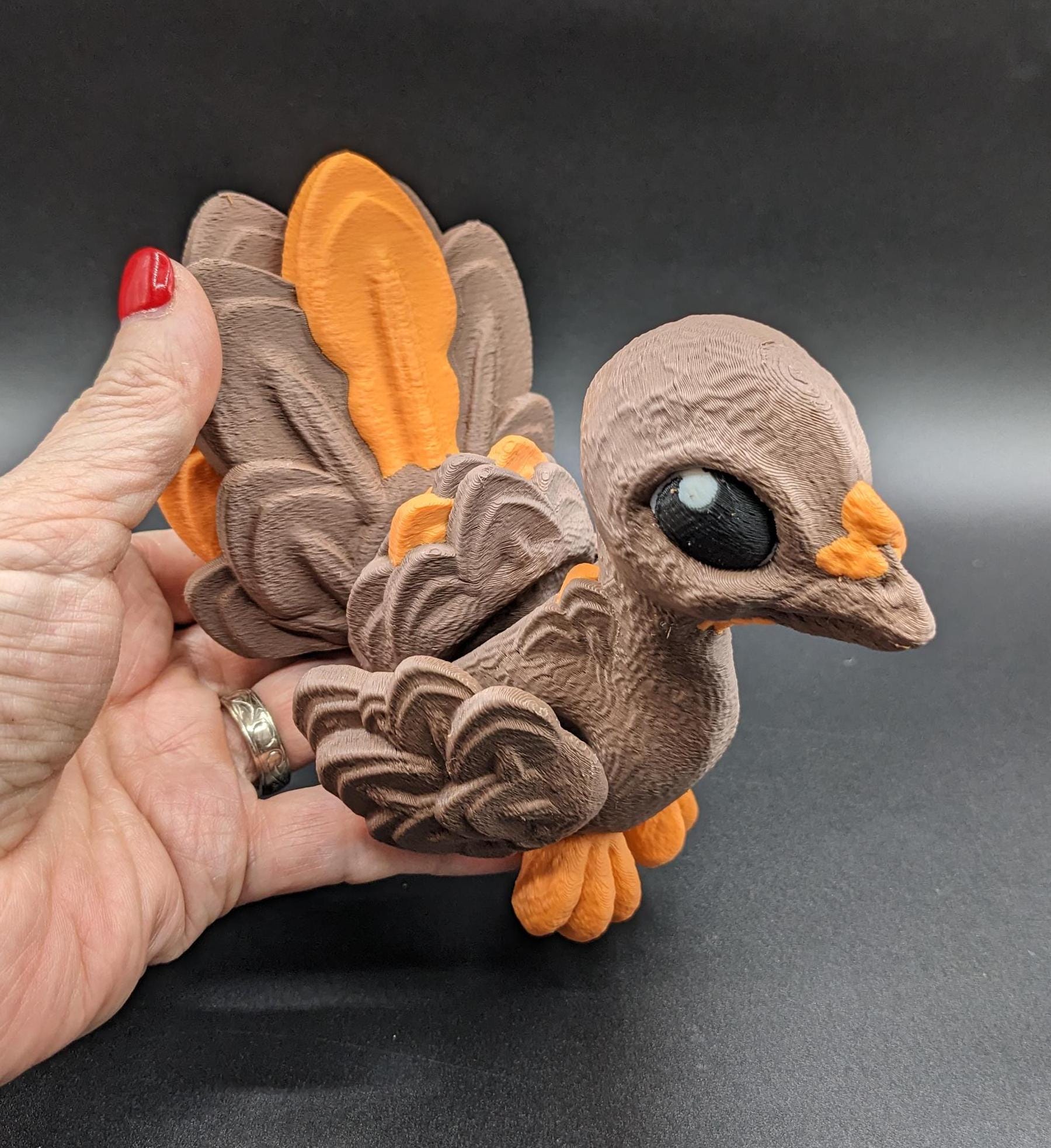 Add charm to your Thanksgiving with our Adorable Articulated Turkey Toy. This delightful turkey is perfect for festive decor and playful fun, making it an ideal addition to your holiday celebrations.