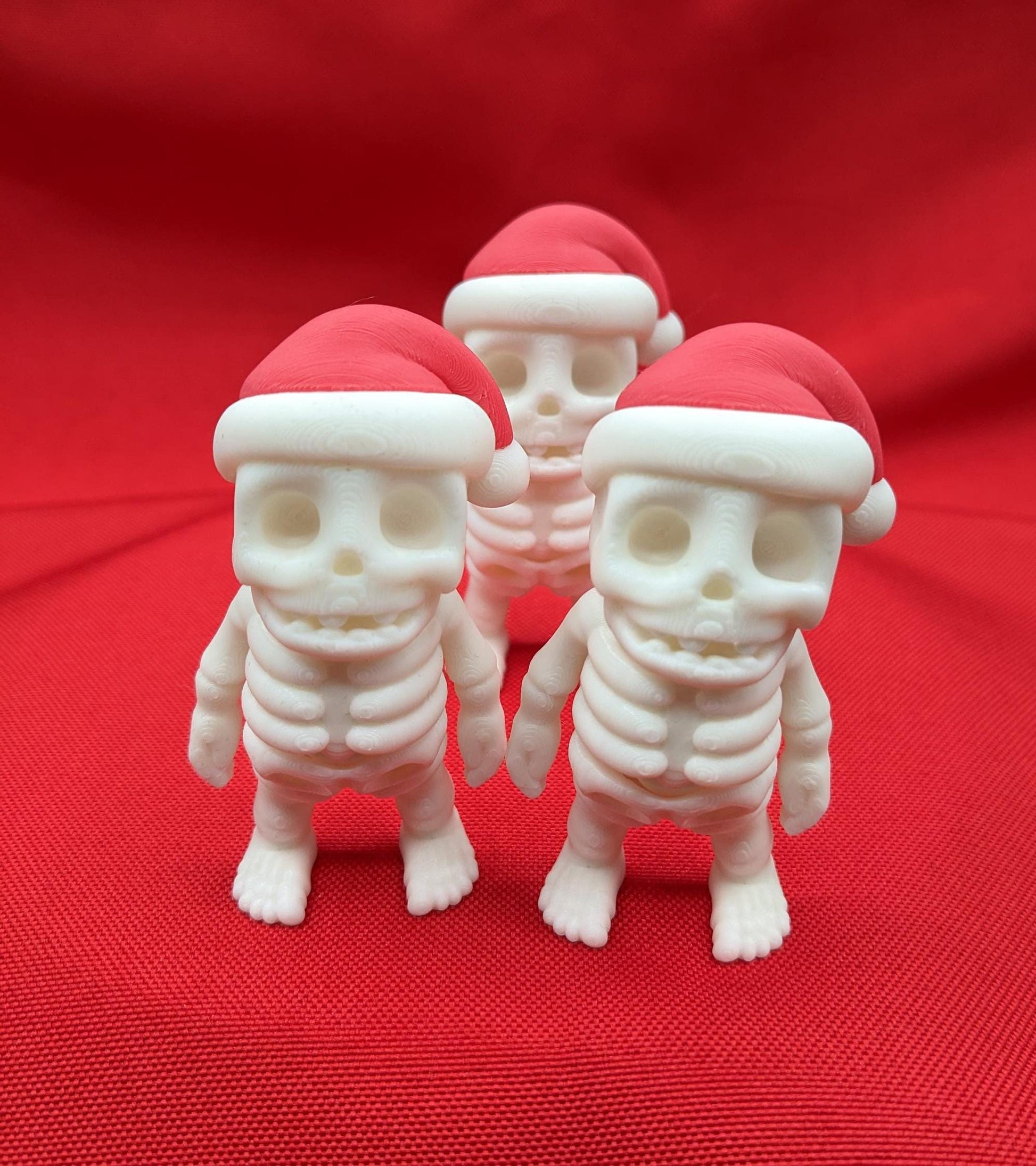 Add a playful twist to your holiday season with the Festive Flexi Christmas Santa Skeleton Fidget Toy! This unique combination of holiday cheer and spooky fun makes it the perfect toy for all ages.