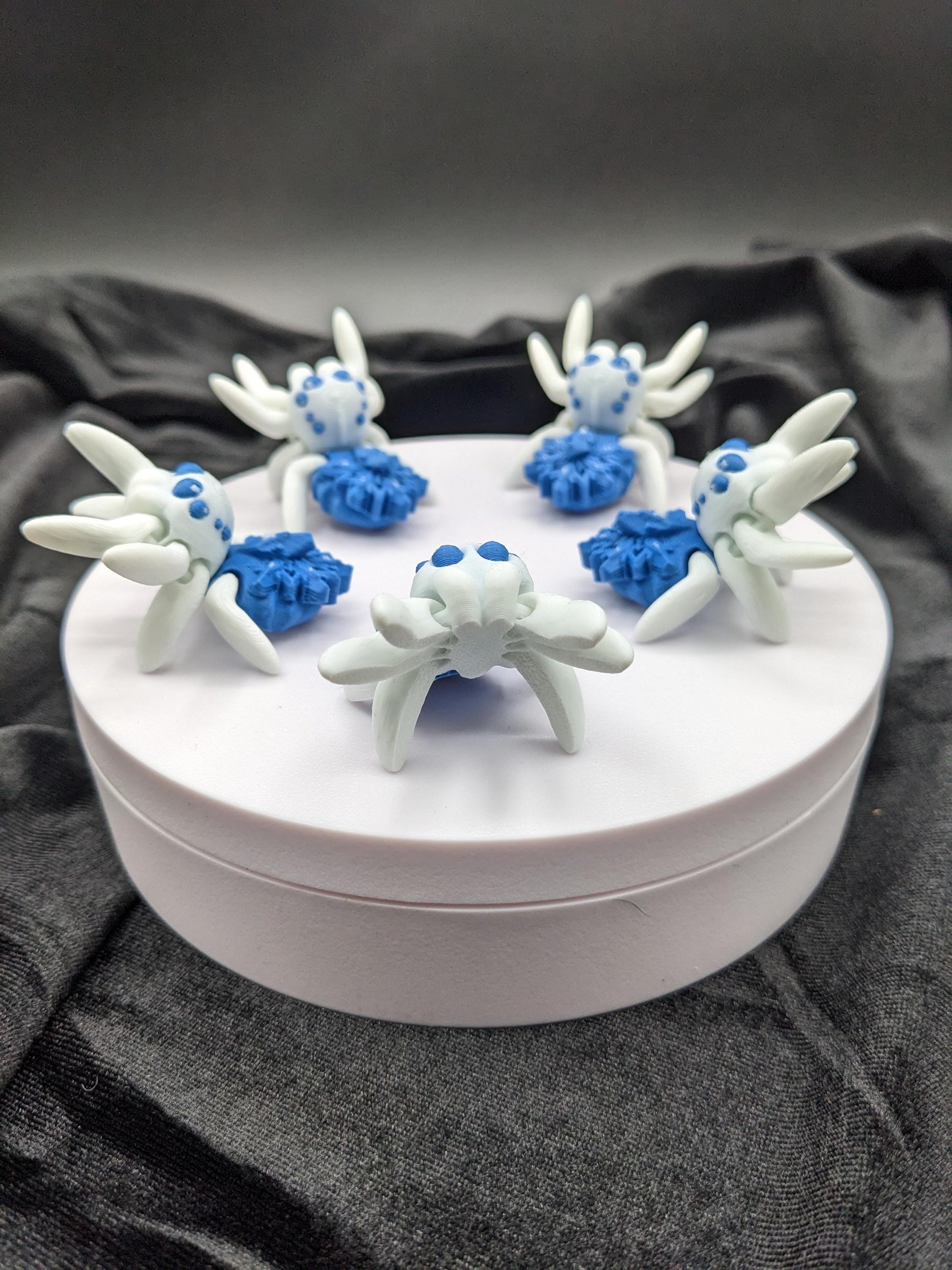 Capture the beauty of winter with our Articulated Snowflake Spider Fidget Toy! This one-of-a-kind spider features intricate snowflake design on its body adding a festive and elegant touch to its playful functionality.
