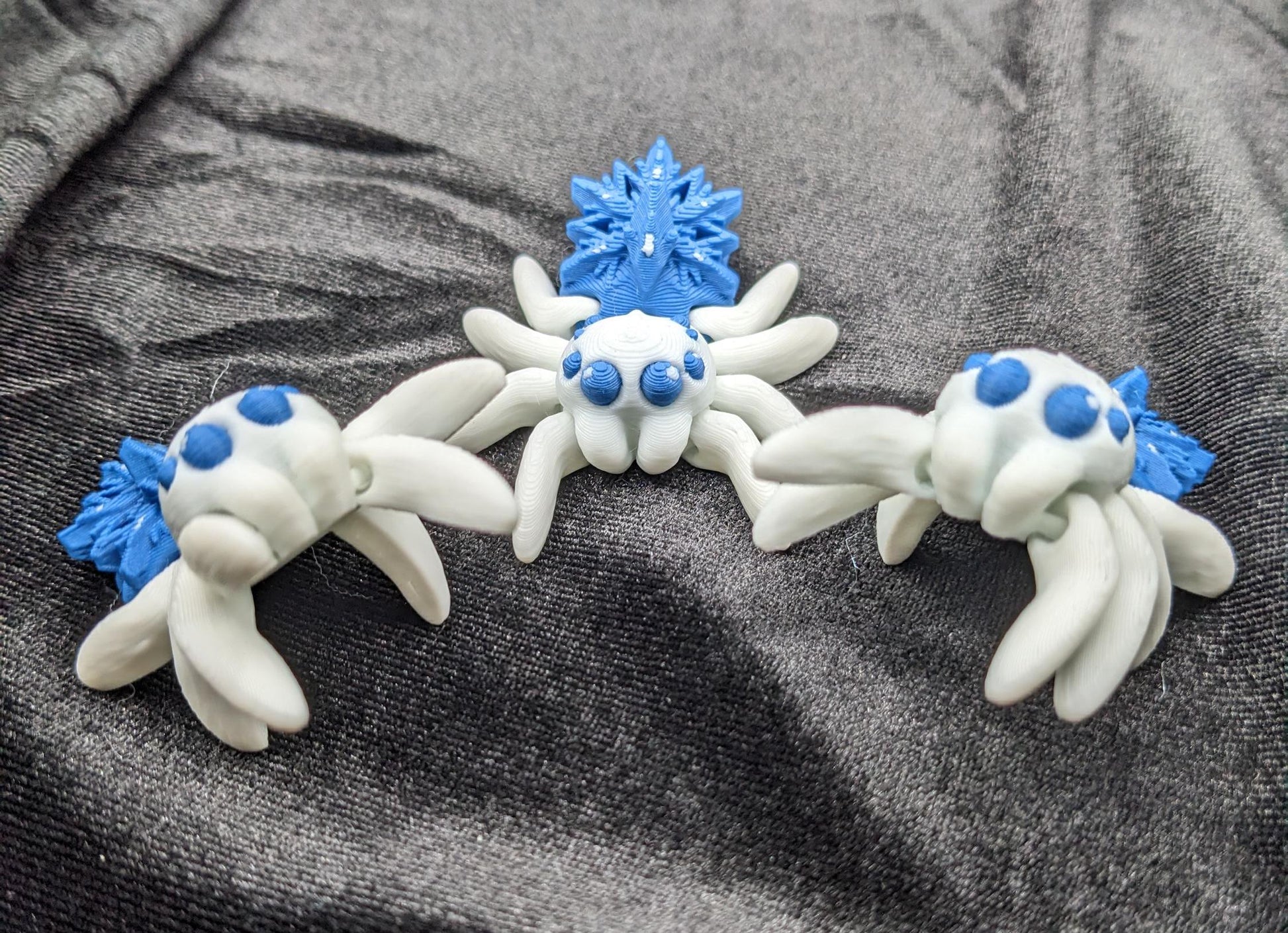 Capture the beauty of winter with our Articulated Snowflake Spider Fidget Toy! This one-of-a-kind spider features intricate snowflake design on its body adding a festive and elegant touch to its playful functionality.