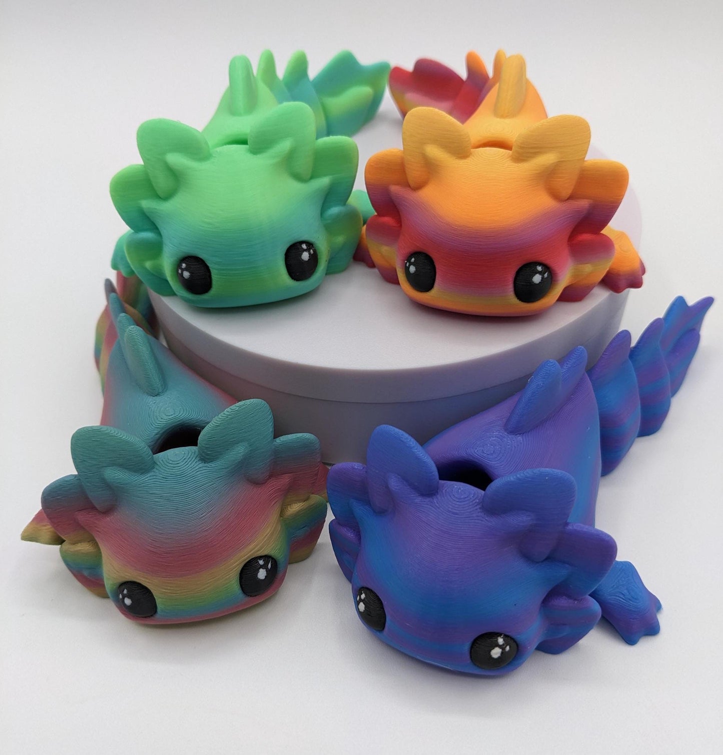 Meet the Adorable Articulated Axolotl Tadpole Fidget Toy, the perfect blend of cuteness and functionality! This 3D-printed axolotl-inspired design features fully articulated joints, making it both fun to fidget with and charming to display.