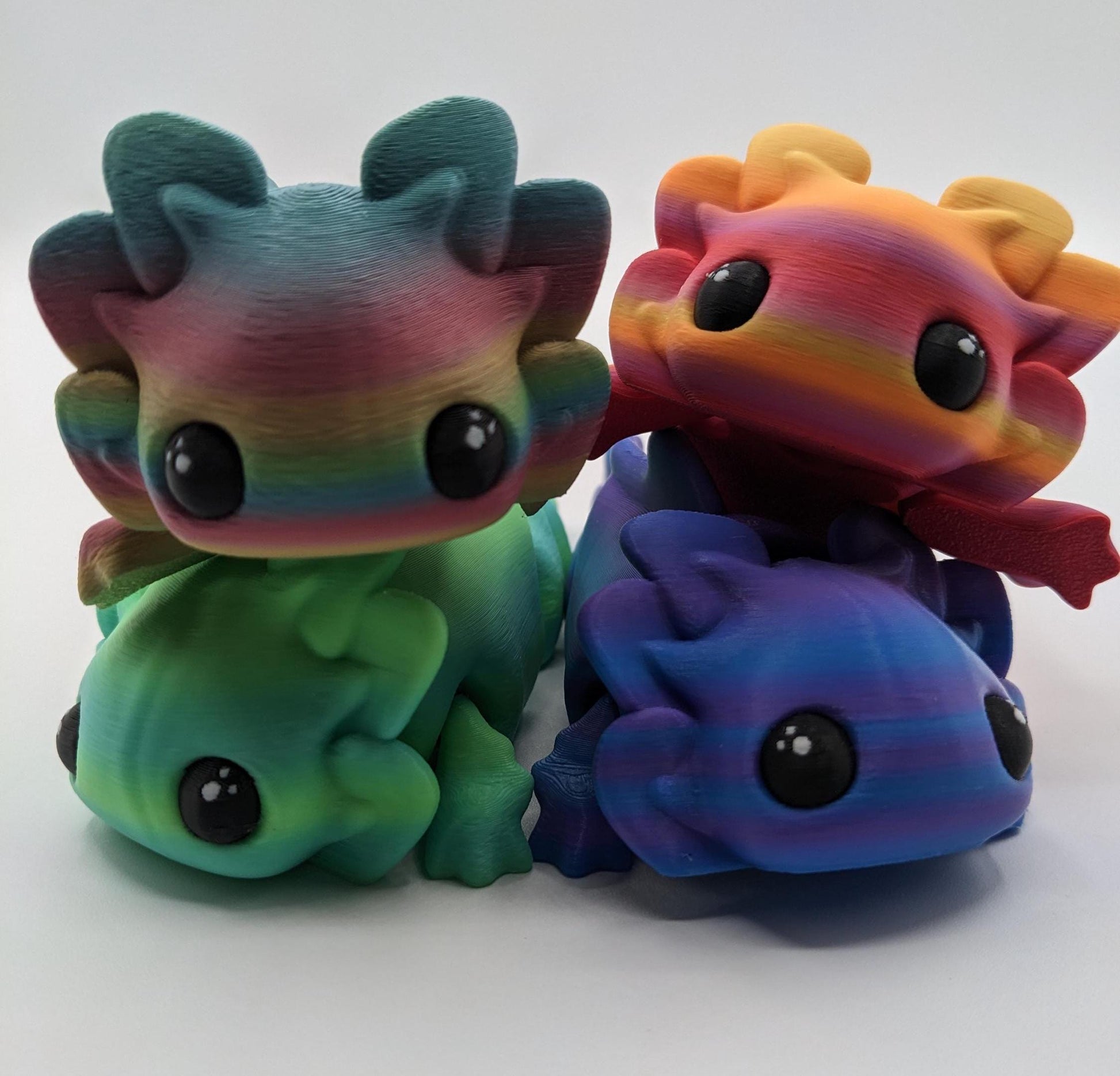 Meet the Adorable Articulated Axolotl Tadpole Fidget Toy, the perfect blend of cuteness and functionality! This 3D-printed axolotl-inspired design features fully articulated joints, making it both fun to fidget with and charming to display.