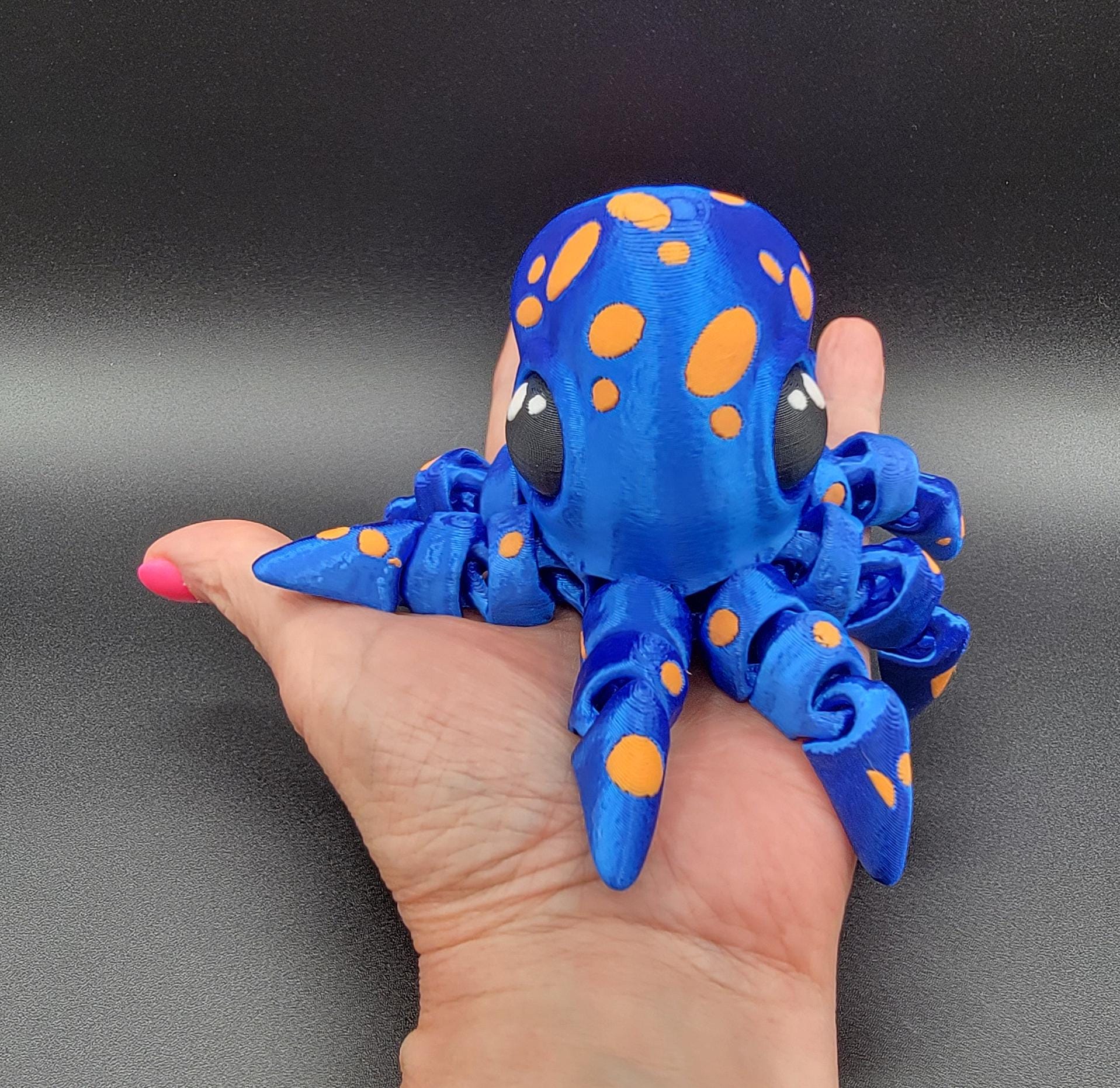 Dive into a world of cuteness and fun with the Adorable Articulated Tiny Octopus! This charming 3D-printed octopus features fully articulated tentacles, making it perfect as a relaxing fidget toy, a playful desk companion