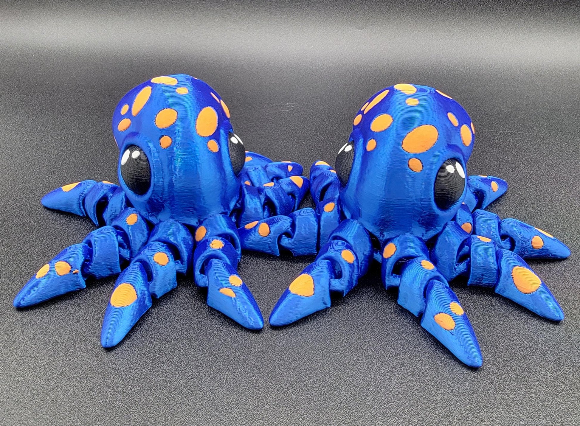 Dive into a world of cuteness and fun with the Adorable Articulated Tiny Octopus! This charming 3D-printed octopus features fully articulated tentacles, making it perfect as a relaxing fidget toy, a playful desk companion