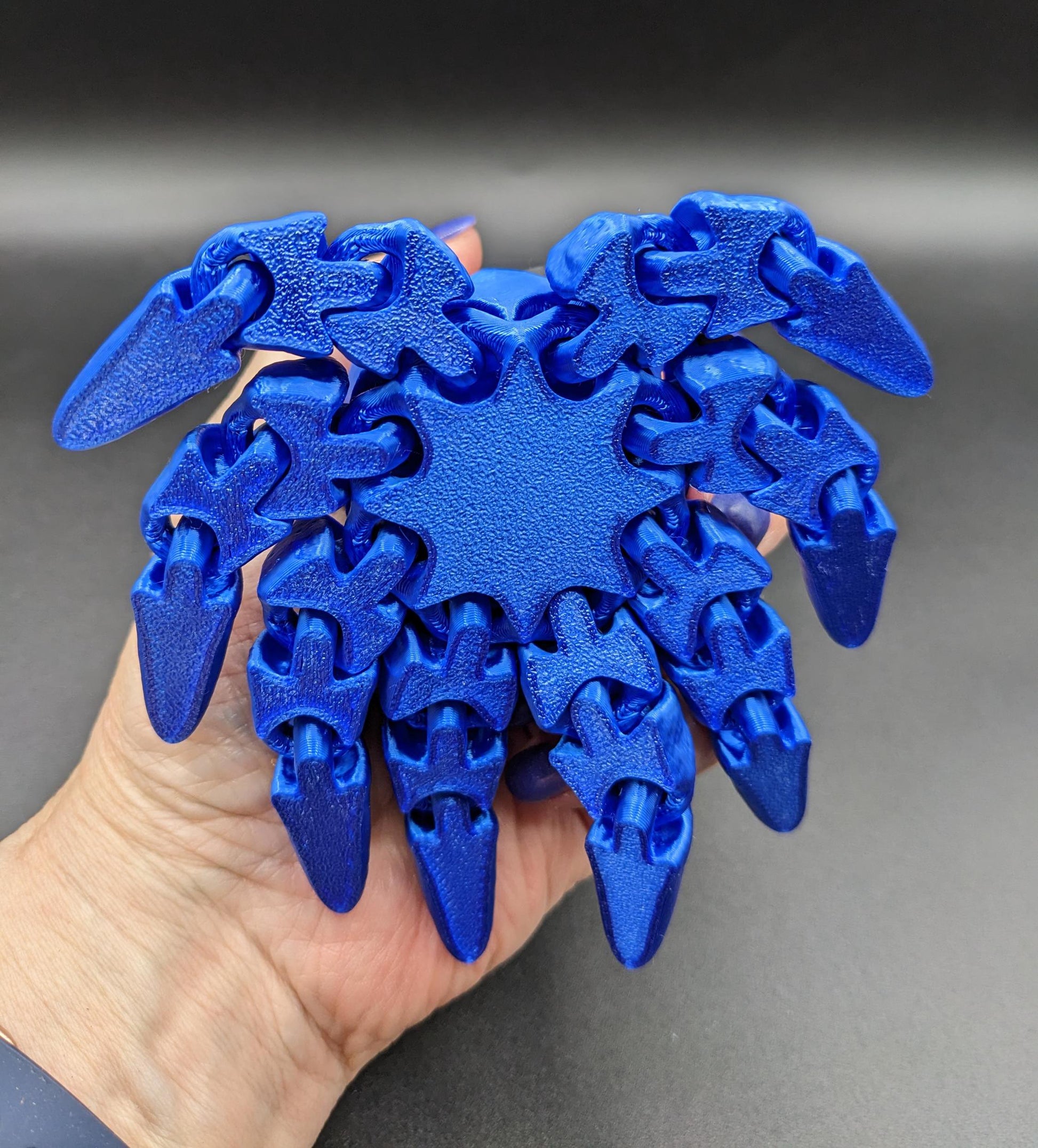 Dive into a world of cuteness and fun with the Adorable Articulated Tiny Octopus! This charming 3D-printed octopus features fully articulated tentacles, making it perfect as a relaxing fidget toy, a playful desk companion