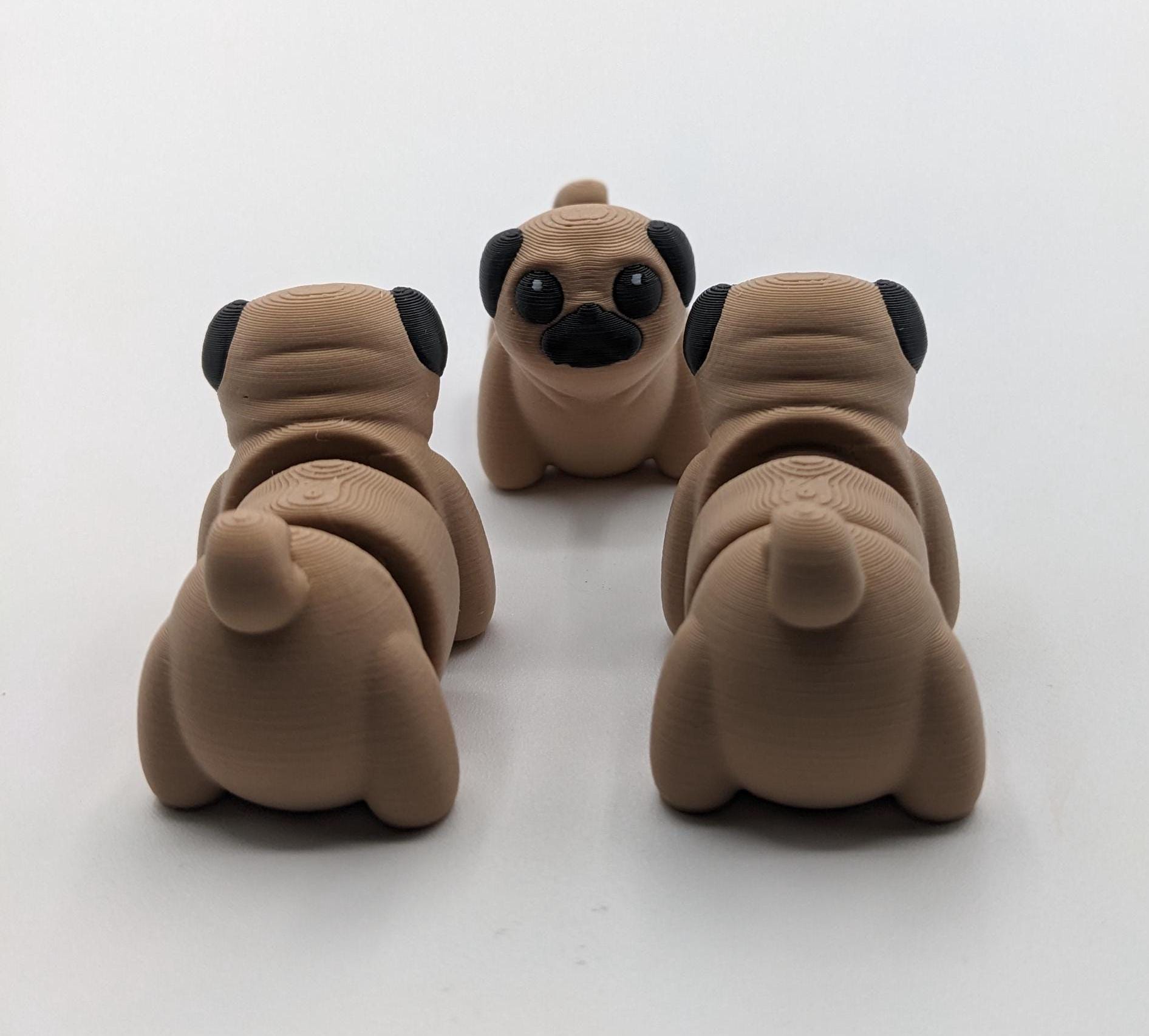 Say hello to the Adorable Articulated Pug Dog Fidget Toy, the perfect combination of cuteness and functionality! Whether you’re a pug lover, a fidget toy enthusiast, or looking for a unique gift, this playful pup is sure to bring joy to your day.
