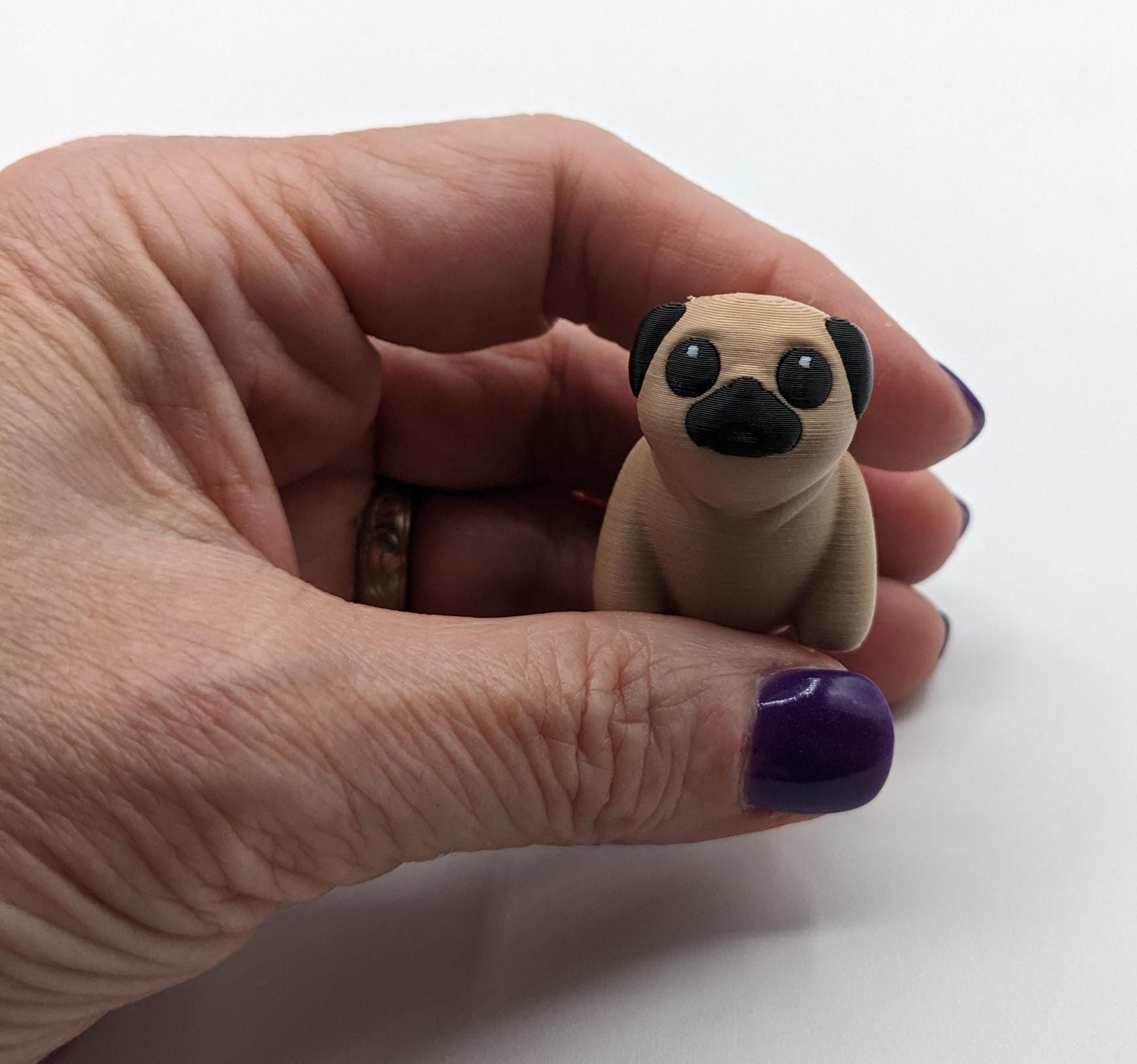 Say hello to the Adorable Articulated Pug Dog Fidget Toy, the perfect combination of cuteness and functionality! Whether you’re a pug lover, a fidget toy enthusiast, or looking for a unique gift, this playful pup is sure to bring joy to your day.