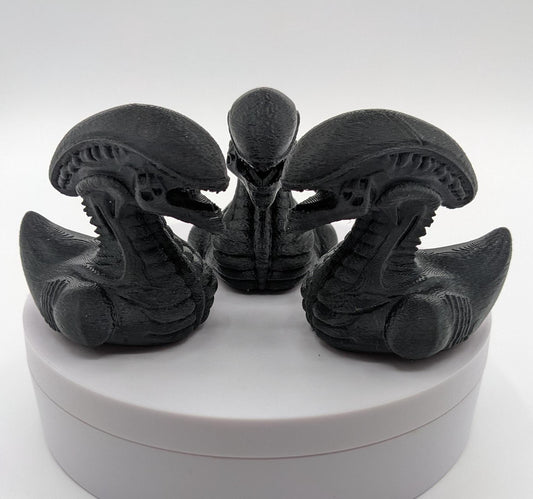 Step into the world of sci-fi and whimsy with the Alien Xenomorph Duck! This one-of-a-kind 3D-printed creation combines the eerie, iconic design of an alien xenomorph with the playful charm of a duck. Perfect for fans of alien creatures, sci-fi enthusiasts, Jeep duck collectors, or anyone who loves quirky collectibles, this hybrid figurine is sure to stand out in any collection.