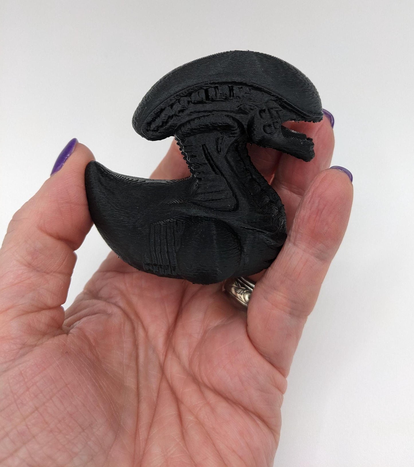 Step into the world of sci-fi and whimsy with the Alien Xenomorph Duck! This one-of-a-kind 3D-printed creation combines the eerie, iconic design of an alien xenomorph with the playful charm of a duck. Perfect for fans of alien creatures, sci-fi enthusiasts, Jeep duck collectors, or anyone who loves quirky collectibles, this hybrid figurine is sure to stand out in any collection.