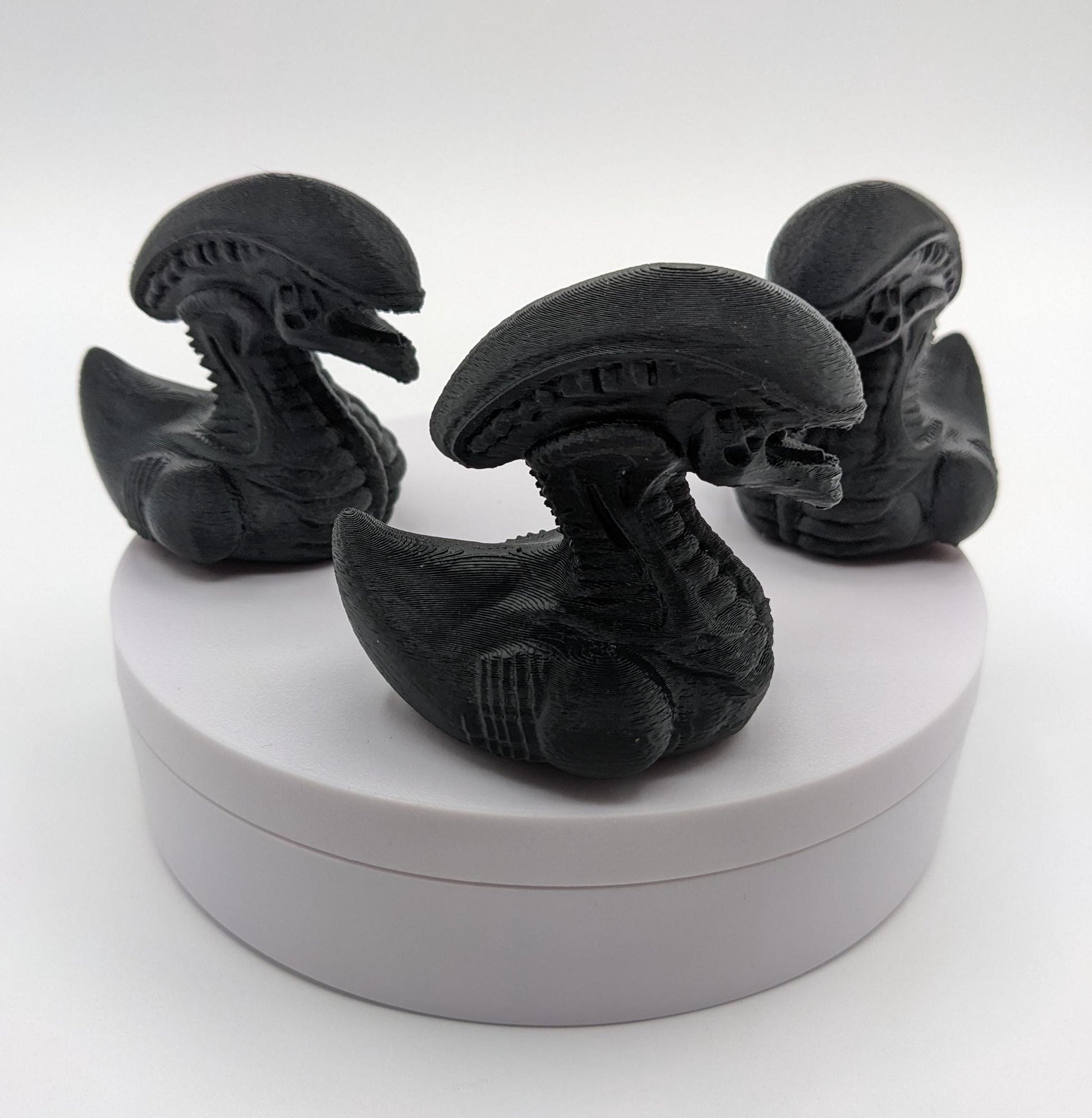 Step into the world of sci-fi and whimsy with the Alien Xenomorph Duck! This one-of-a-kind 3D-printed creation combines the eerie, iconic design of an alien xenomorph with the playful charm of a duck. Perfect for fans of alien creatures, sci-fi enthusiasts, Jeep duck collectors, or anyone who loves quirky collectibles, this hybrid figurine is sure to stand out in any collection.