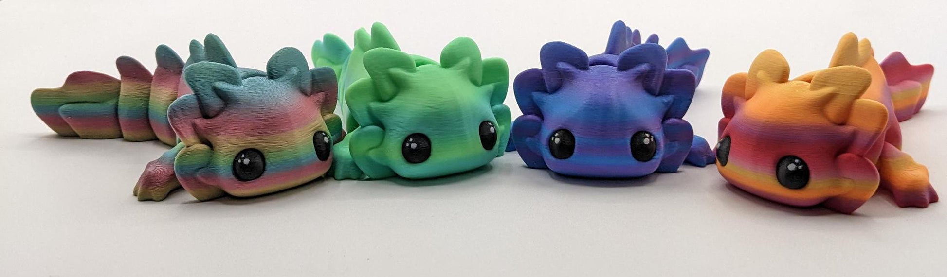 Meet the Adorable Articulated Axolotl Tadpole Fidget Toy, the perfect blend of cuteness and functionality! This 3D-printed axolotl-inspired design features fully articulated joints, making it both fun to fidget with and charming to display.