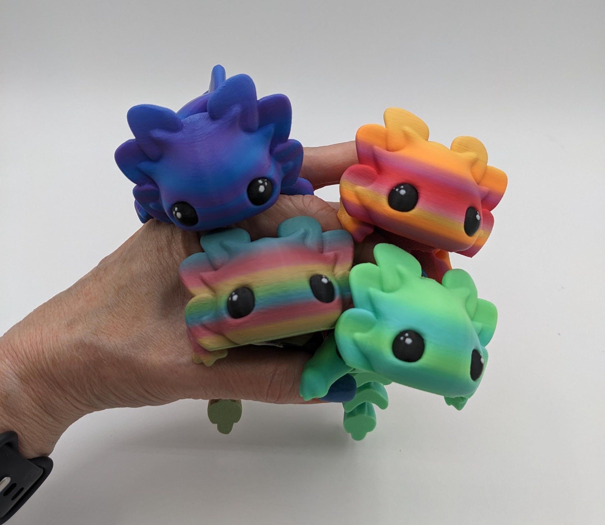 Meet the Adorable Articulated Axolotl Tadpole Fidget Toy, the perfect blend of cuteness and functionality! This 3D-printed axolotl-inspired design features fully articulated joints, making it both fun to fidget with and charming to display.