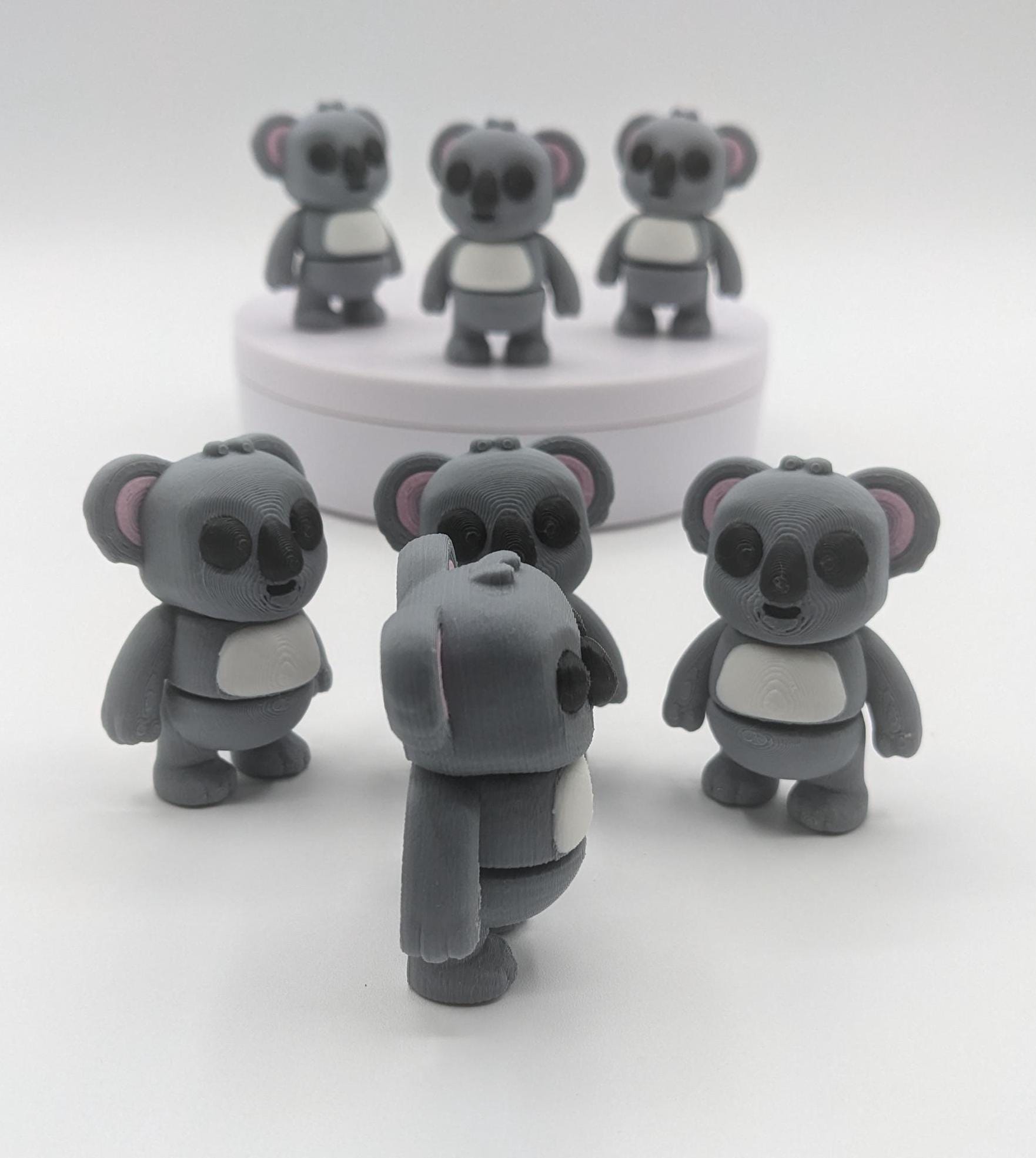 Bring cuteness and relaxation to your day with the Adorable Tiny Articulated Koala Fidget Toy! This charming 3D-printed koala is designed with  articulated joints, making it perfect for fidgeting, creative play, or as a fun pocket sized friend!
