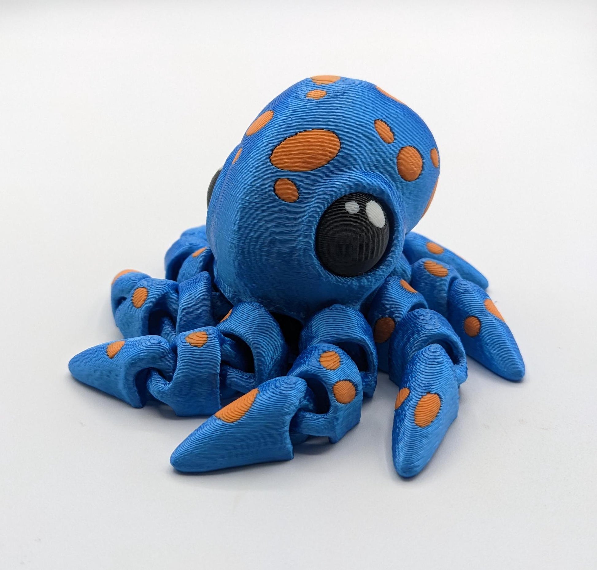 Dive into a world of cuteness and fun with the Adorable Articulated Tiny Octopus! This charming 3D-printed octopus features fully articulated tentacles, making it perfect as a relaxing fidget toy, a playful desk companion