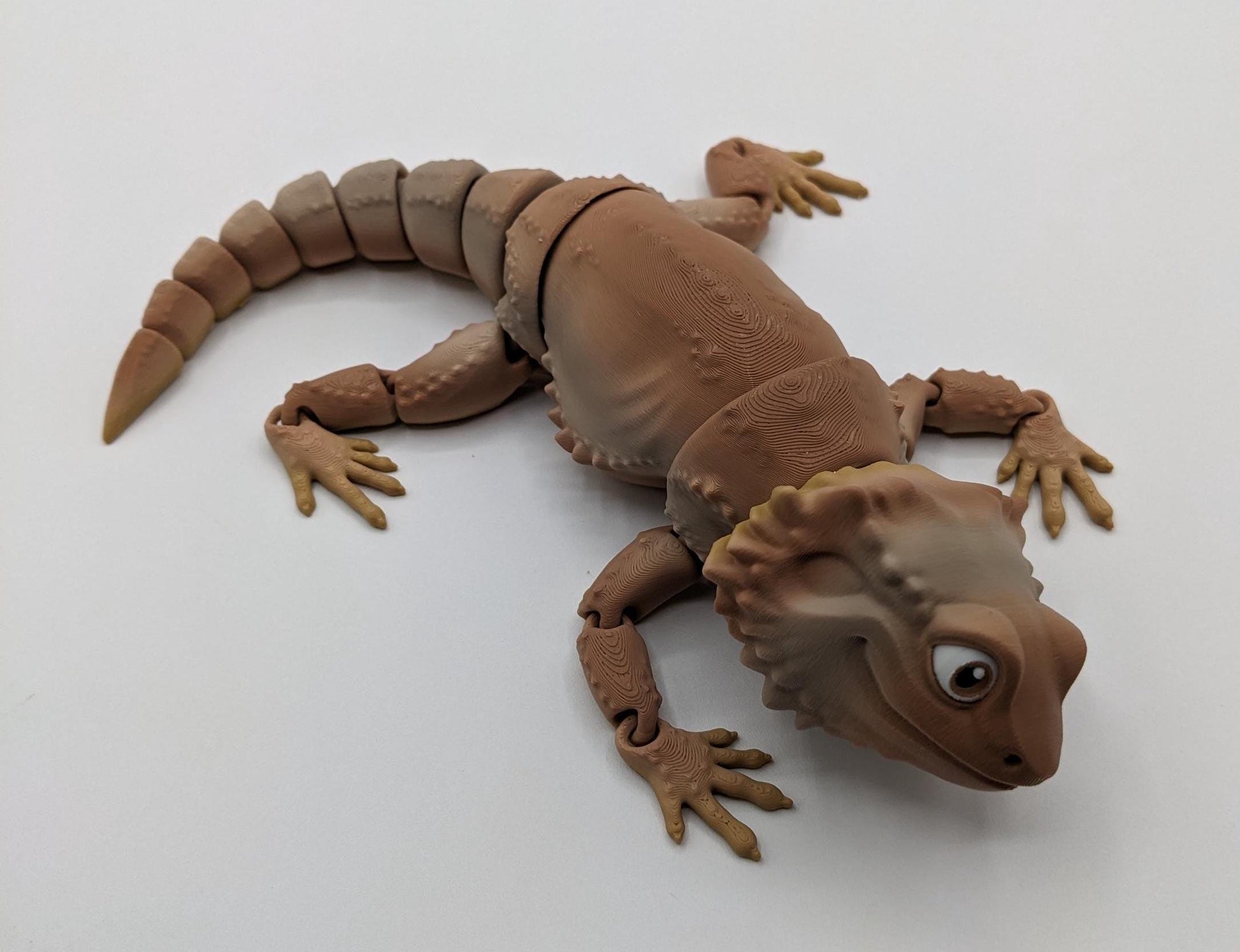 Add a little reptilian charm to your fidget toy collection with the Articulated Bearded Dragon Fidget Toy! Whether you’re looking for a fun stress-relief tool, a unique gift, or a playful collectible, this fully poseable dragon is guaranteed to bring smiles. Lightweight, durable, and customizable, it’s the perfect way to combine creativity and fun.
