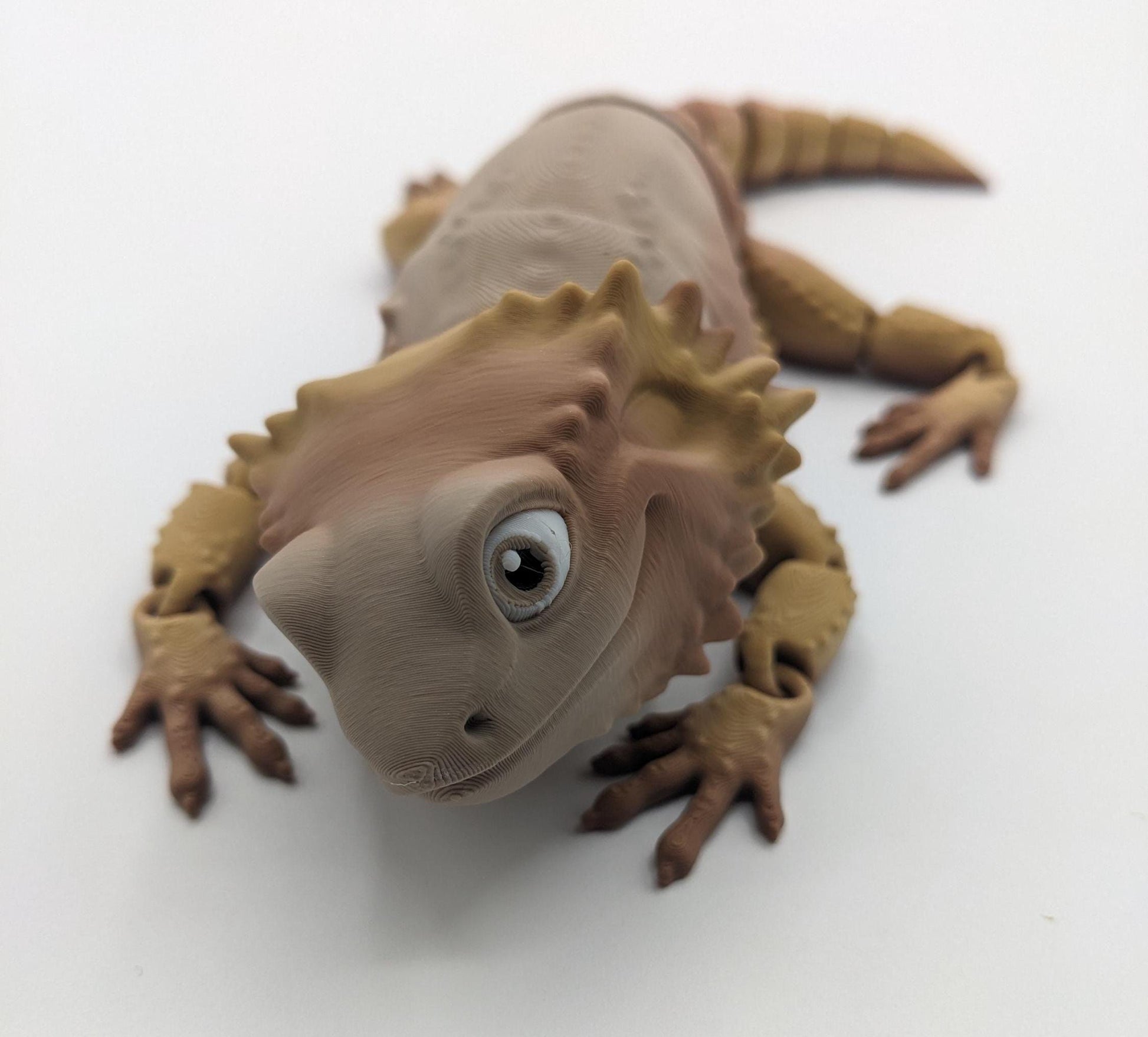 Add a little reptilian charm to your fidget toy collection with the Articulated Bearded Dragon Fidget Toy! Whether you’re looking for a fun stress-relief tool, a unique gift, or a playful collectible, this fully poseable dragon is guaranteed to bring smiles. Lightweight, durable, and customizable, it’s the perfect way to combine creativity and fun.