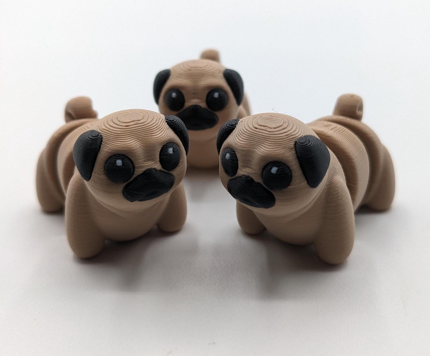Say hello to the Adorable Articulated Pug Dog Fidget Toy, the perfect combination of cuteness and functionality! Whether you’re a pug lover, a fidget toy enthusiast, or looking for a unique gift, this playful pup is sure to bring joy to your day.
