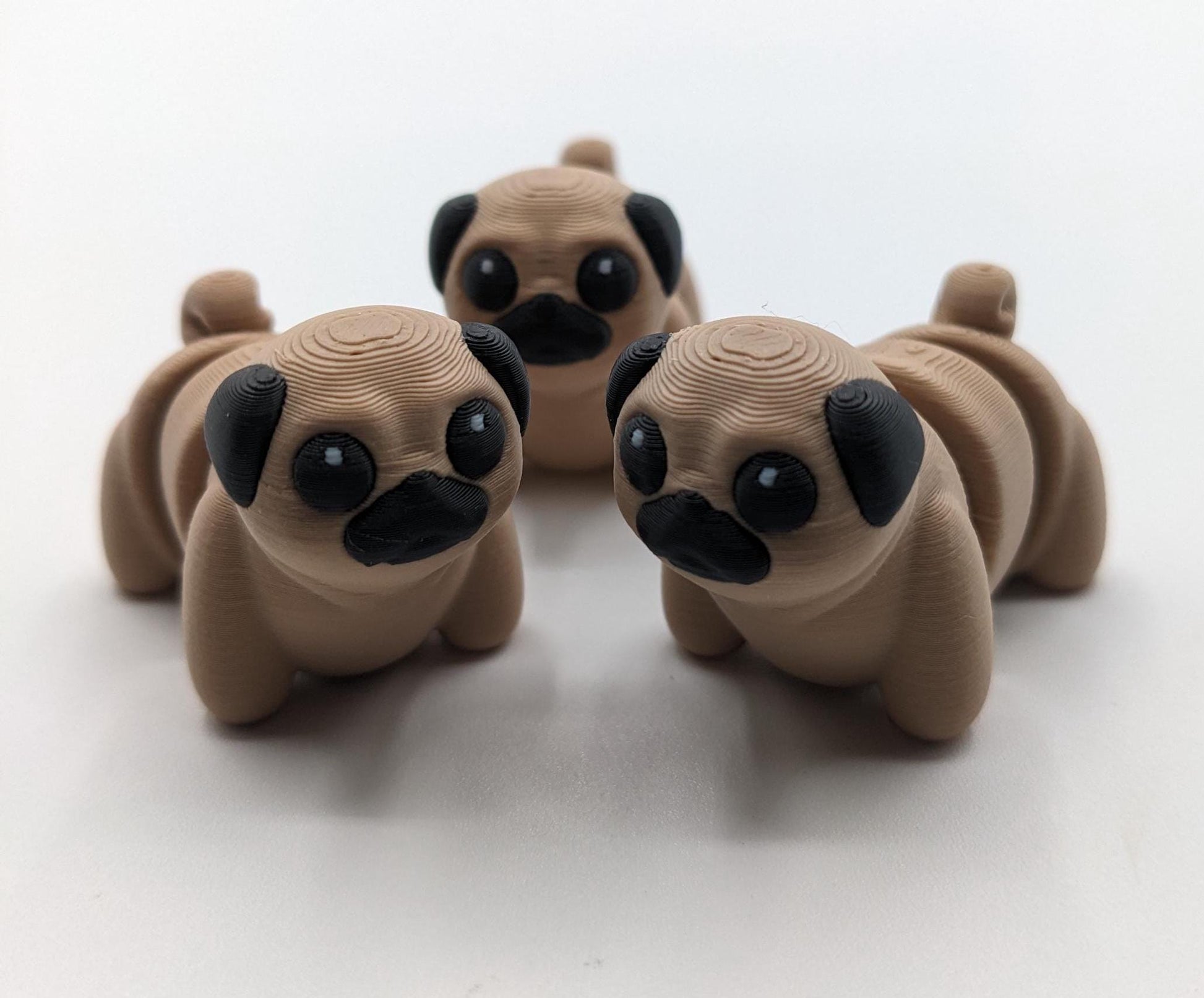 Say hello to the Adorable Articulated Pug Dog Fidget Toy, the perfect combination of cuteness and functionality! Whether you’re a pug lover, a fidget toy enthusiast, or looking for a unique gift, this playful pup is sure to bring joy to your day.