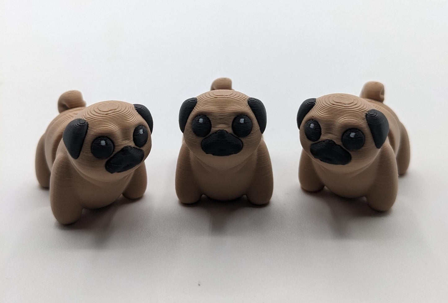 Say hello to the Adorable Articulated Pug Dog Fidget Toy, the perfect combination of cuteness and functionality! Whether you’re a pug lover, a fidget toy enthusiast, or looking for a unique gift, this playful pup is sure to bring joy to your day.
