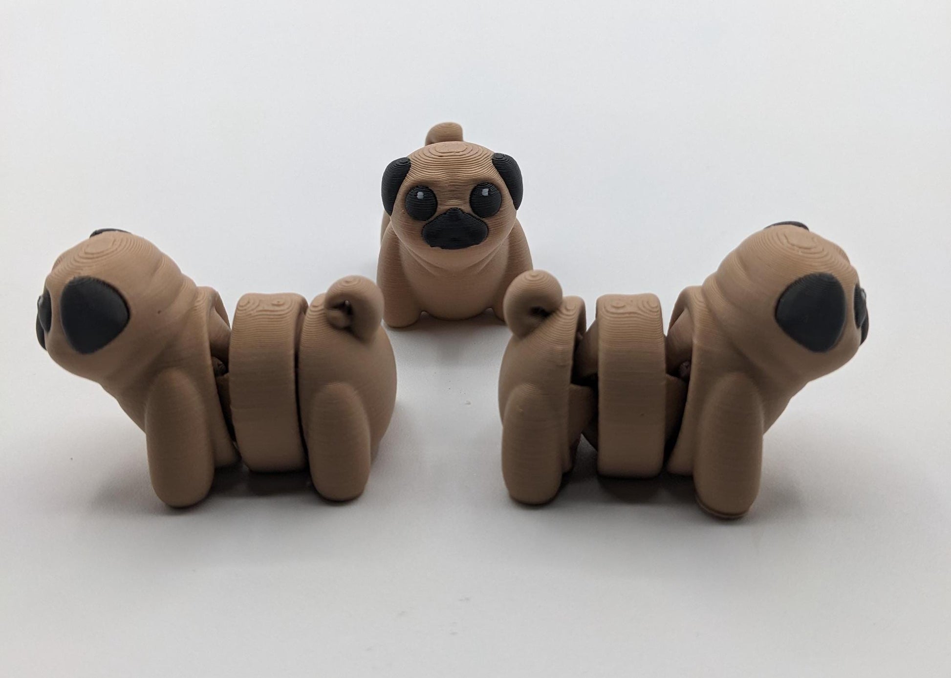 Say hello to the Adorable Articulated Pug Dog Fidget Toy, the perfect combination of cuteness and functionality! Whether you’re a pug lover, a fidget toy enthusiast, or looking for a unique gift, this playful pup is sure to bring joy to your day.