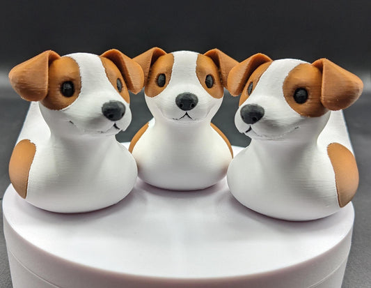 All our ducks are printed in PETG filament, a more expensive filament without the upcharge, as PETG is UV stable, heat and moisture tolerant. PLA color will fade if left on the dash of a car or in direct sunlight. Say hello to the Friendly Jack Russell Terrier Dog Duck Toy, the perfect blend of playful charm and quirky creativity! Whether you’re a dog lover, a Jeep duck collector, or simply someone who enjoys unique and fun decor, this adorable hybrid toy is sure to bring a smile to your face.