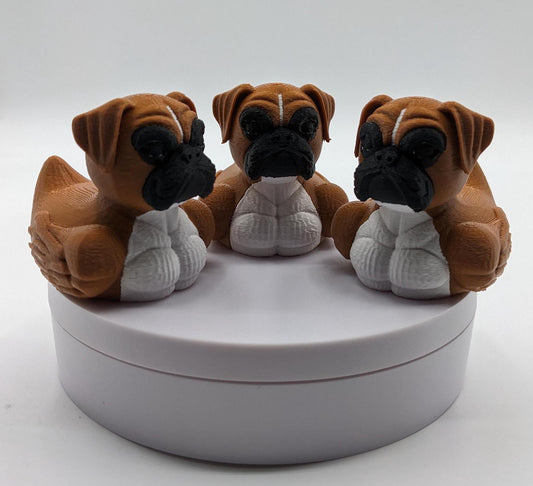 Meet The Magnificent Boxer Duck, a creative and charming 3D-printed hybrid that combines the strong, playful personality of a Boxer dog with the whimsical charm of a duck! This one-of-a-kind figurine is perfect for Boxer lovers, dog enthusiasts, Jeep duck collectors, or anyone who enjoys quirky and imaginative decor. Whether displayed on a shelf, a Jeep dash, added to your collection, or given as a thoughtful gift, this Boxer Duck is guaranteed to bring smiles and brighten up any room.