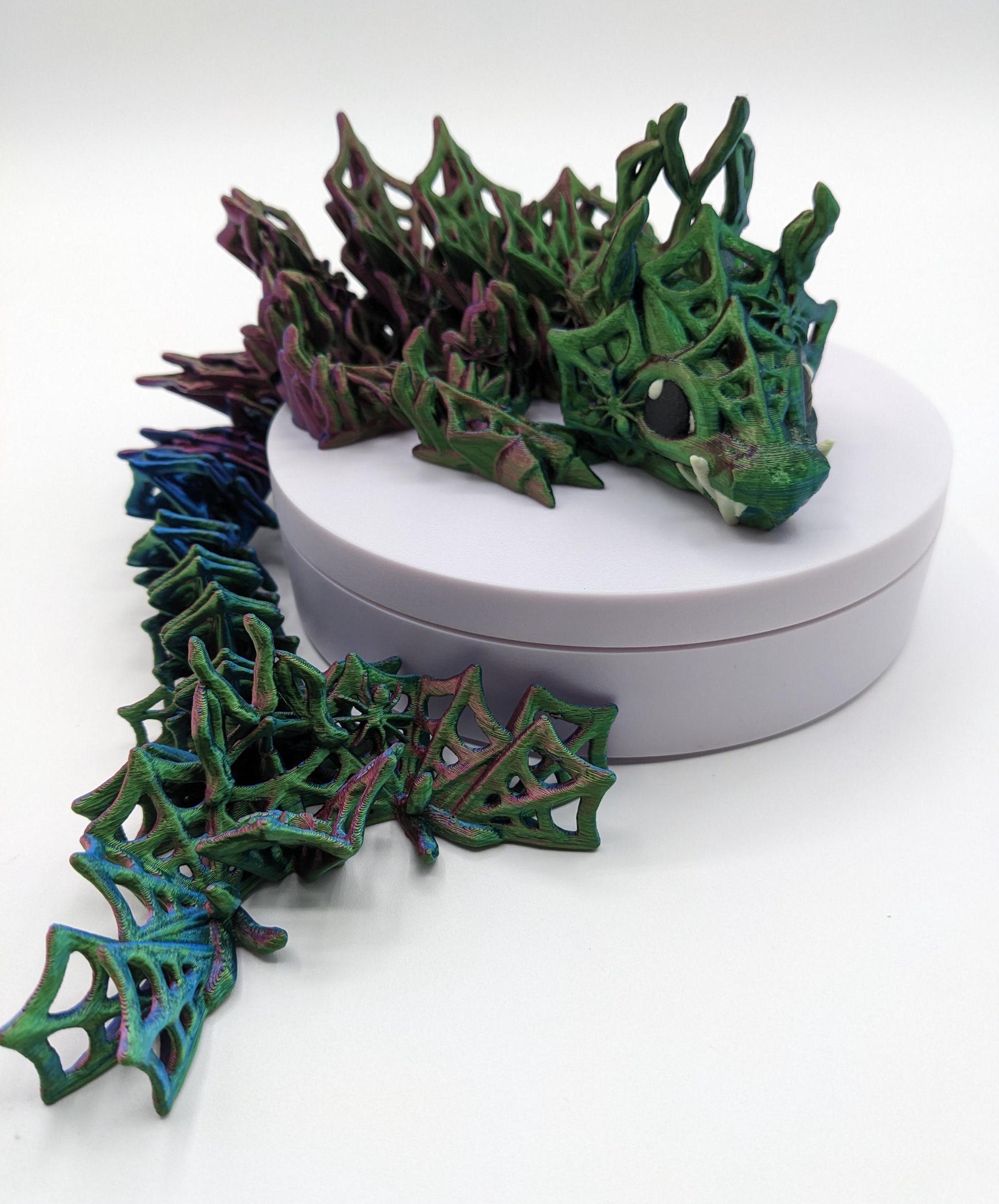Our Baby Wicked Dragon sculpture is a masterpiece of mythical design, intricately crafted to capture the essence of this dark and mysterious creature. With its menacing features, wickedly detailed scales, and sinister posture, this dragon is a work of art that embodies the allure of the shadows.