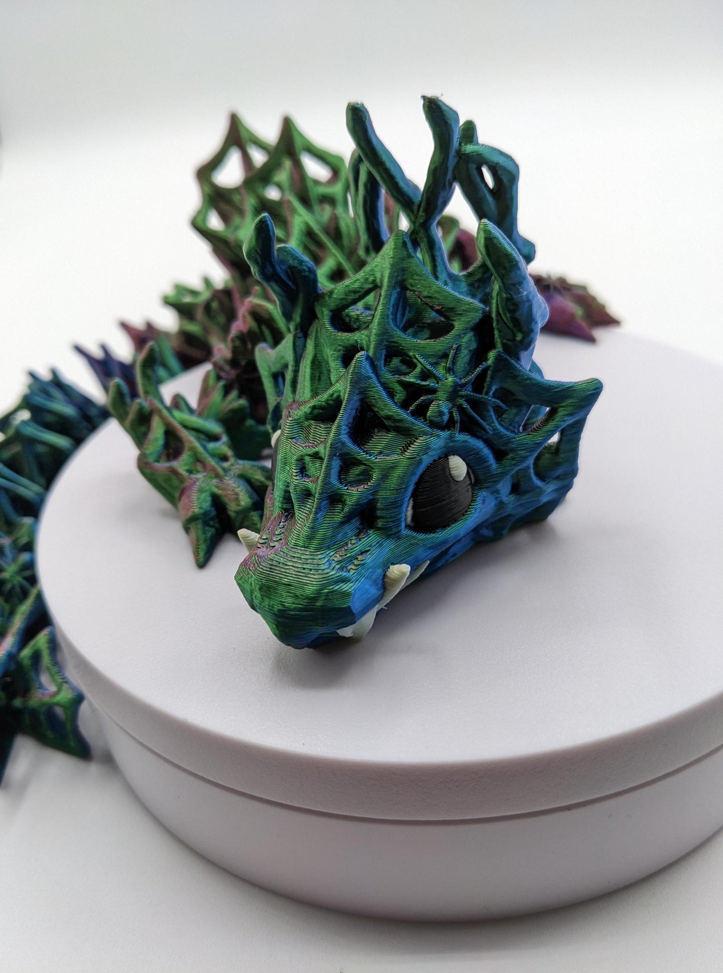 Our Baby Wicked Dragon sculpture is a masterpiece of mythical design, intricately crafted to capture the essence of this dark and mysterious creature. With its menacing features, wickedly detailed scales, and sinister posture, this dragon is a work of art that embodies the allure of the shadows.