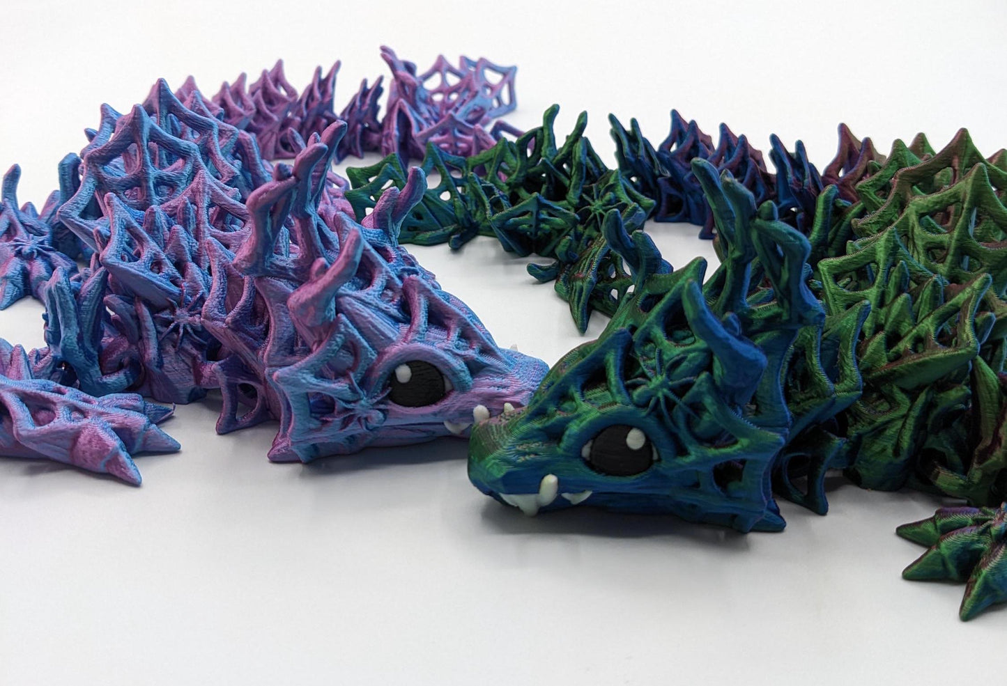Our Baby Wicked Dragon sculpture is a masterpiece of mythical design, intricately crafted to capture the essence of this dark and mysterious creature. With its menacing features, wickedly detailed scales, and sinister posture, this dragon is a work of art that embodies the allure of the shadows.