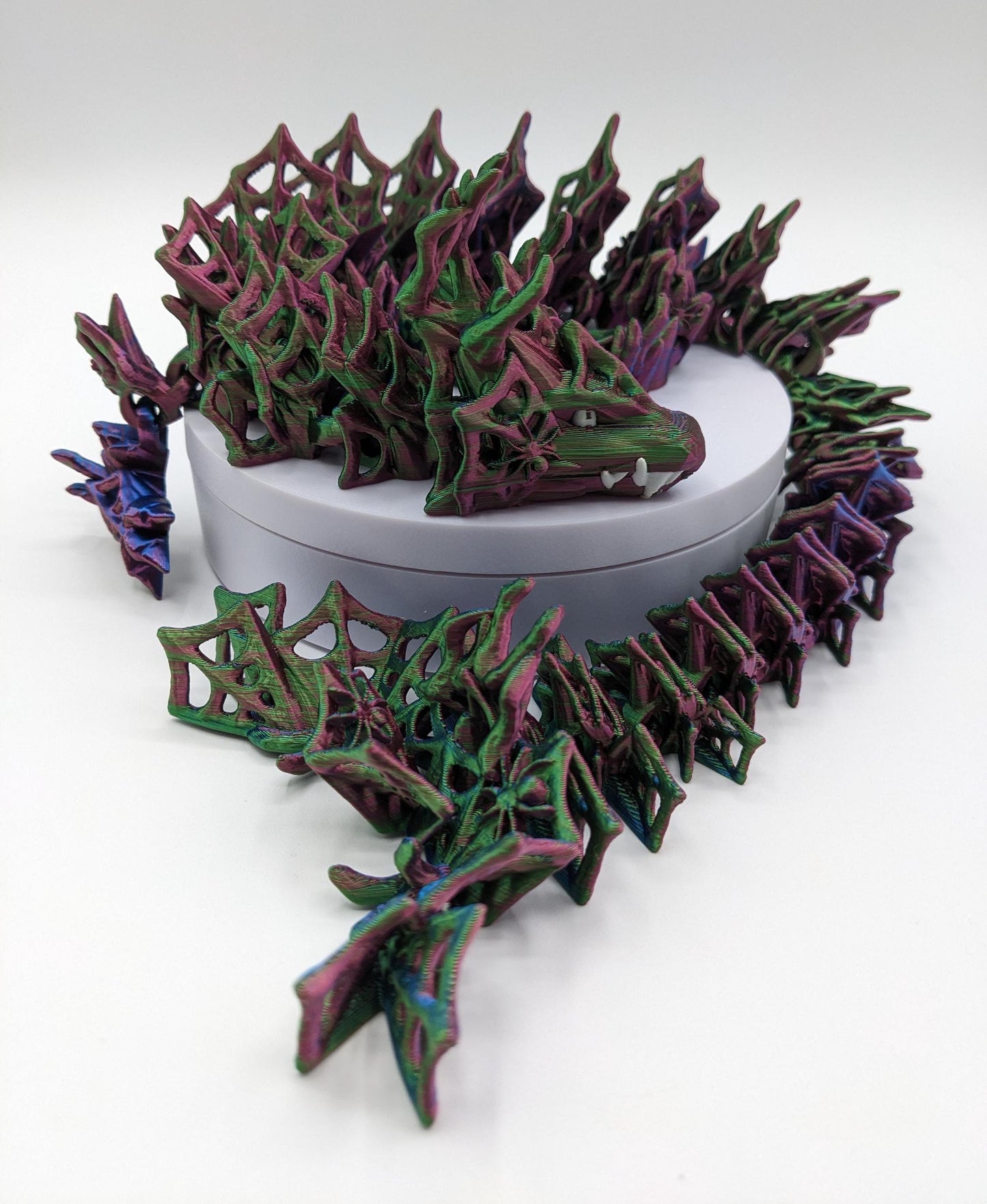 Embrace the allure of darkness and fantasy with the 3D Printed Wicked Dragon by Cinderwing. Order yours today and let this mesmerizing creature take you on a journey into the shadows. Don&#39;t miss the opportunity to own a piece of art that celebrates the mystique of the wicked and the extraordinary.