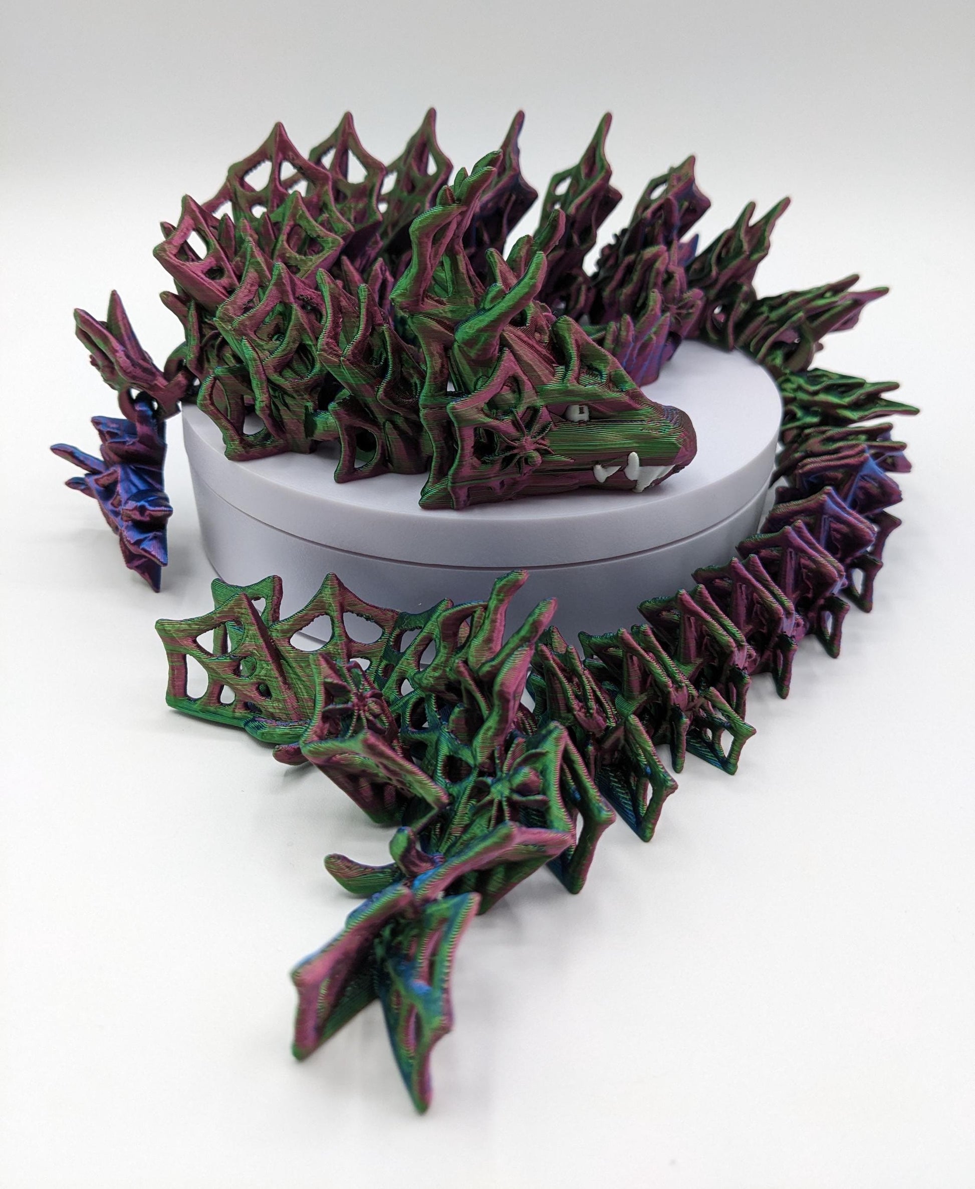 Embrace the allure of darkness and fantasy with the 3D Printed Wicked Dragon by Cinderwing. Order yours today and let this mesmerizing creature take you on a journey into the shadows. Don&#39;t miss the opportunity to own a piece of art that celebrates the mystique of the wicked and the extraordinary.