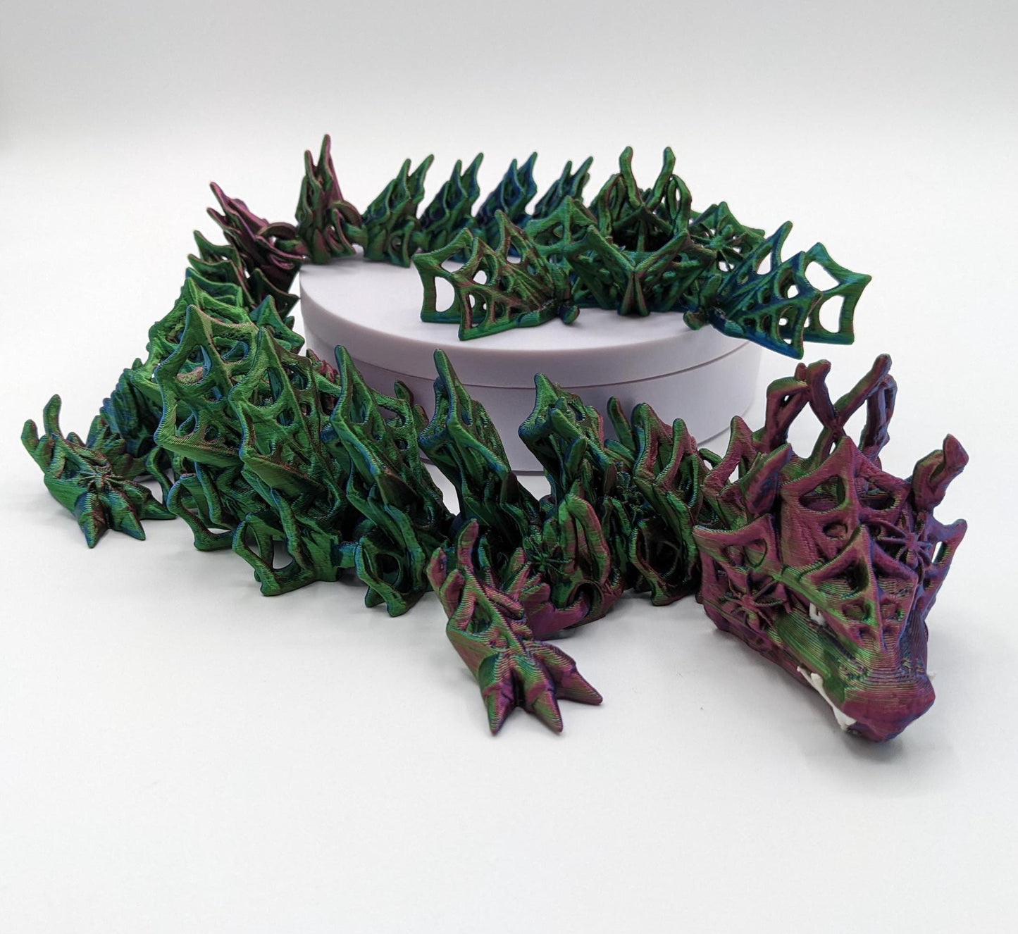 Embrace the allure of darkness and fantasy with the 3D Printed Wicked Dragon by Cinderwing. Order yours today and let this mesmerizing creature take you on a journey into the shadows. Don&#39;t miss the opportunity to own a piece of art that celebrates the mystique of the wicked and the extraordinary.