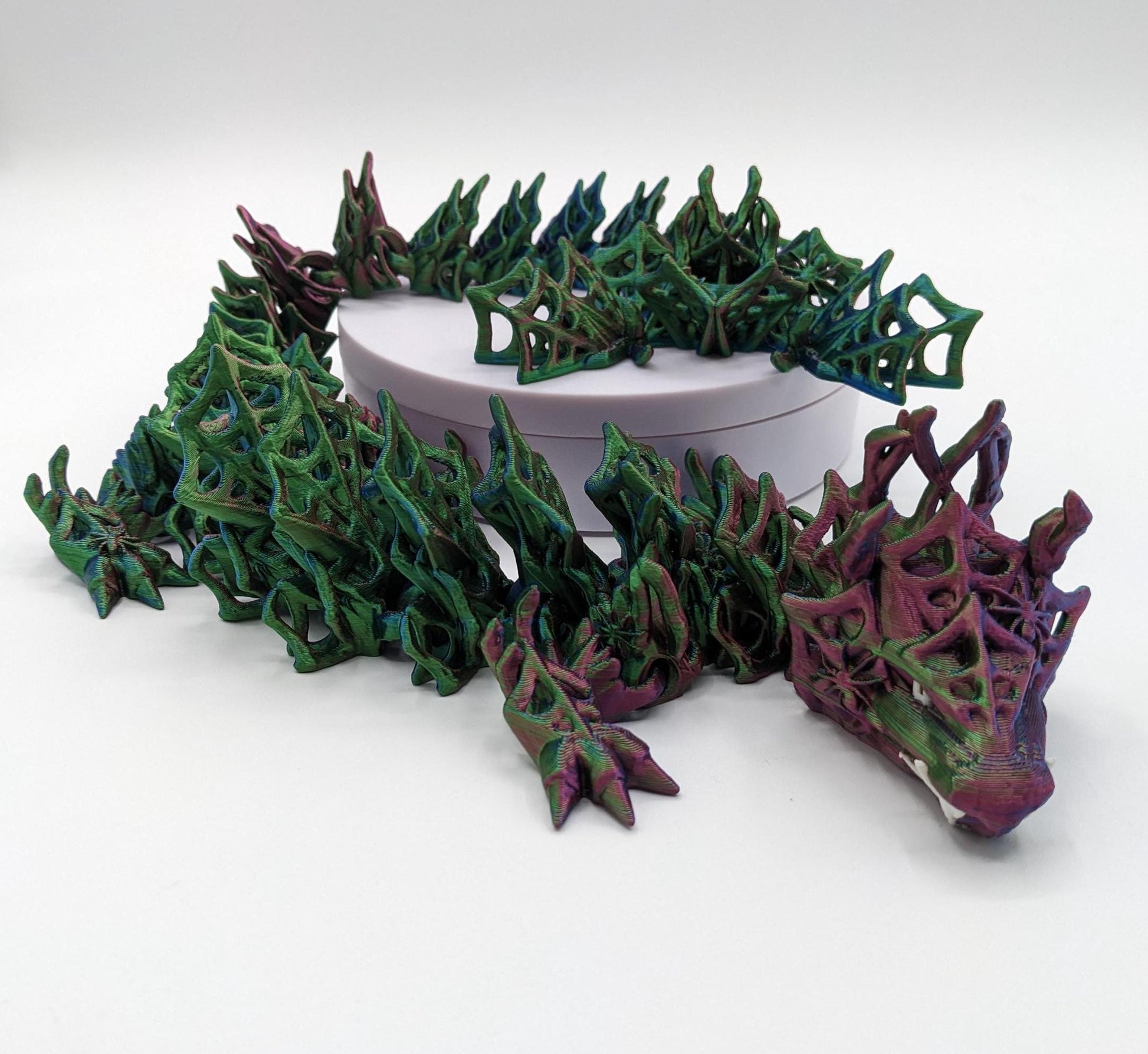 Embrace the allure of darkness and fantasy with the 3D Printed Wicked Dragon by Cinderwing. Order yours today and let this mesmerizing creature take you on a journey into the shadows. Don&#39;t miss the opportunity to own a piece of art that celebrates the mystique of the wicked and the extraordinary.