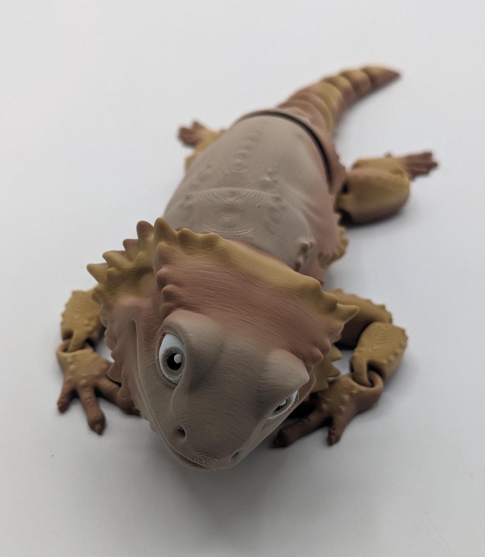 Add a little reptilian charm to your fidget toy collection with the Articulated Bearded Dragon Fidget Toy! Whether you’re looking for a fun stress-relief tool, a unique gift, or a playful collectible, this fully poseable dragon is guaranteed to bring smiles. Lightweight, durable, and customizable, it’s the perfect way to combine creativity and fun.